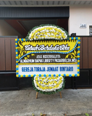 Papan Bunga Duka di Inikgal